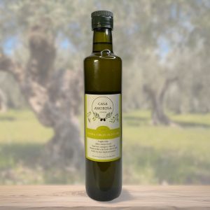 Casa Amorosa bottle of extra virgin olive oil in an Italian olive grove